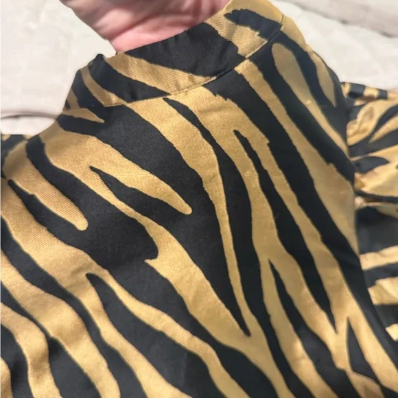 NWT mini dress 
This is the cutest dress. Very nice material. Sold out online. - Picture 3 of 10